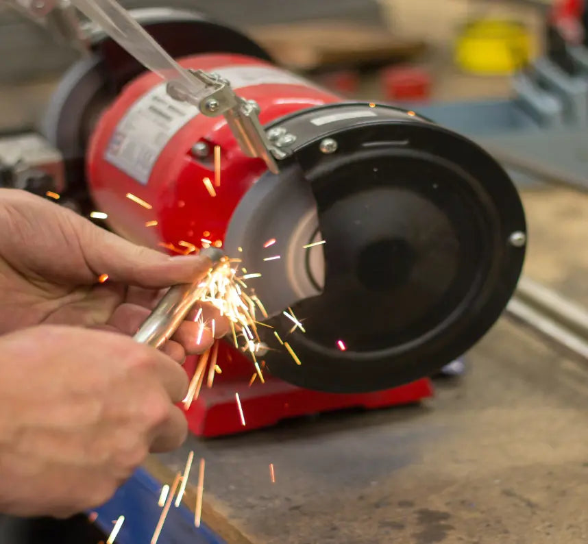 Man welding a car part