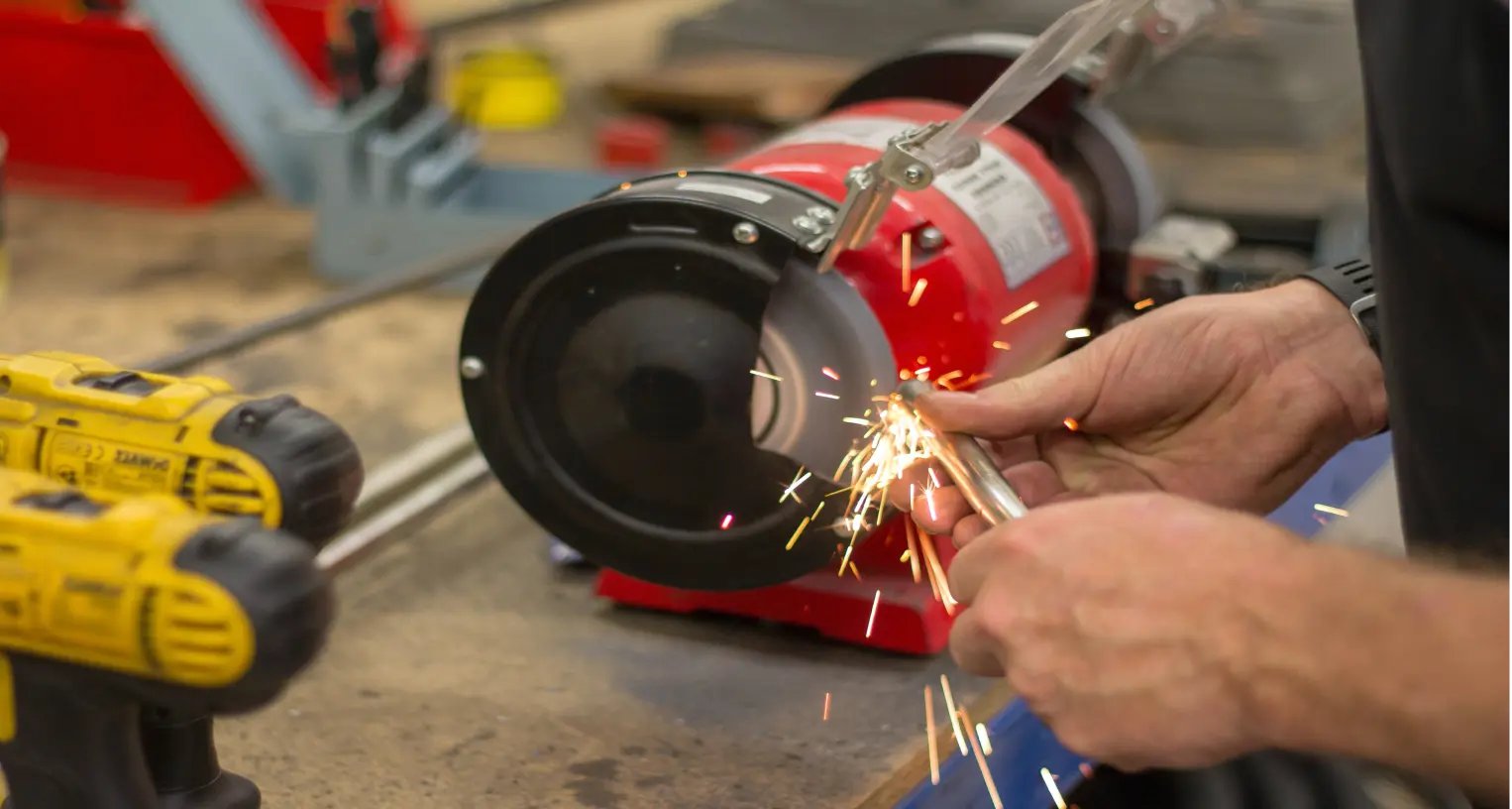 Man welding a car part